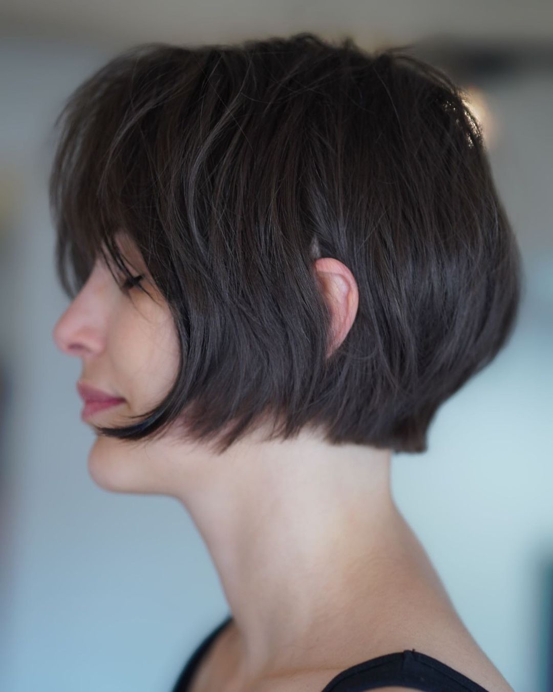 Lip-Length Layered Bob Cut with Bangs